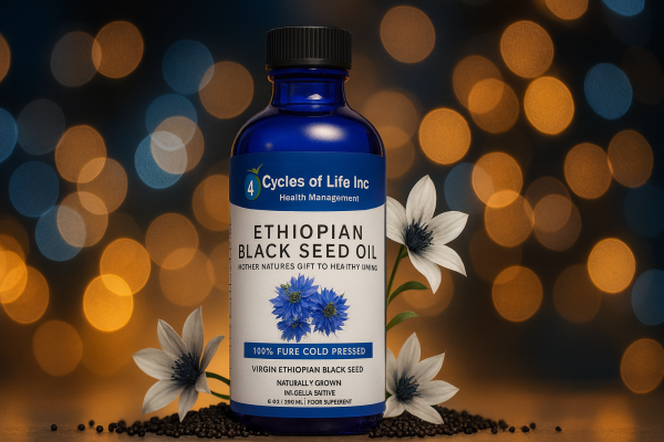 Image of Ethiopian Black Seed oil bottle with flowers and seeds on laying on the bottom Thumbnail